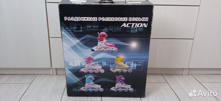 Роликовые коньки