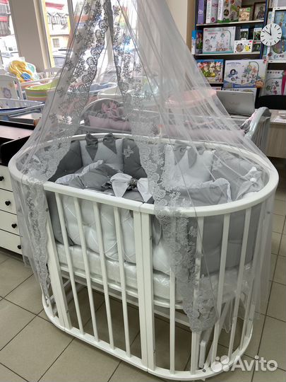 Детская кроватка круглая овальная с маятником