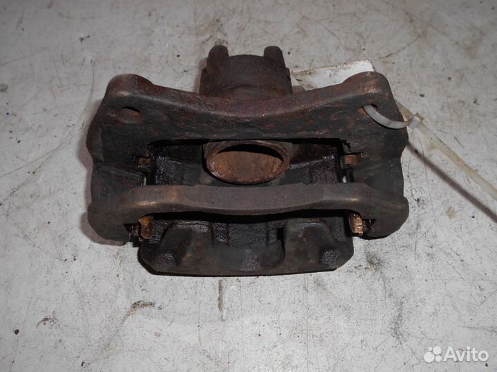 Суппорт передний левый Mitsubishi Lancer 10