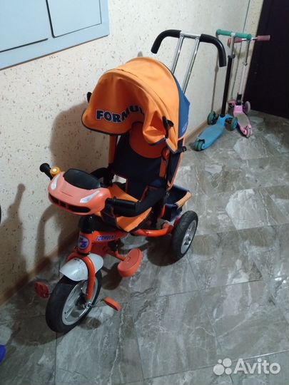 Детский велосипед с родительской ручкой