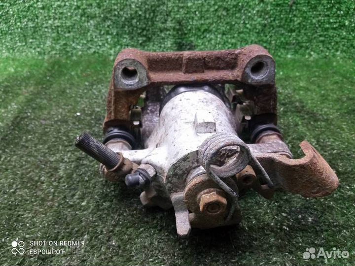 Суппорт задний левый Opel Astra H (2004-2014)