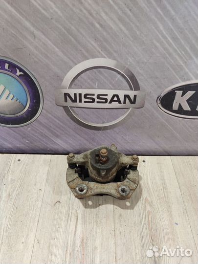 Суппорт тормозной перед Nissan primera P12 Прав
