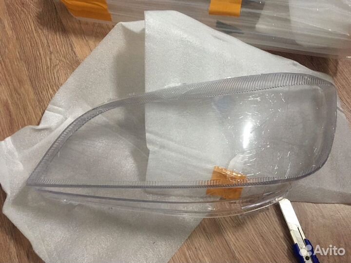 Стекло фары Опель Зафира А