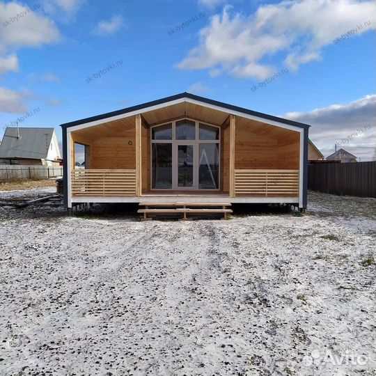 Каркасный дом 12х8м с террасой в стели барн хаус