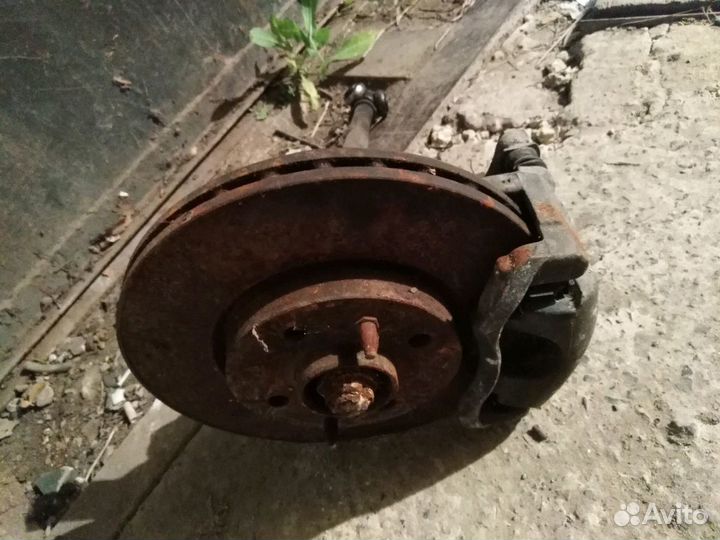 Кулак поворотный с супортом от Fiat albea