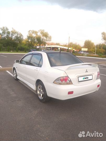 Mitsubishi Lancer 2.0 AT, 2006, 200 700 км