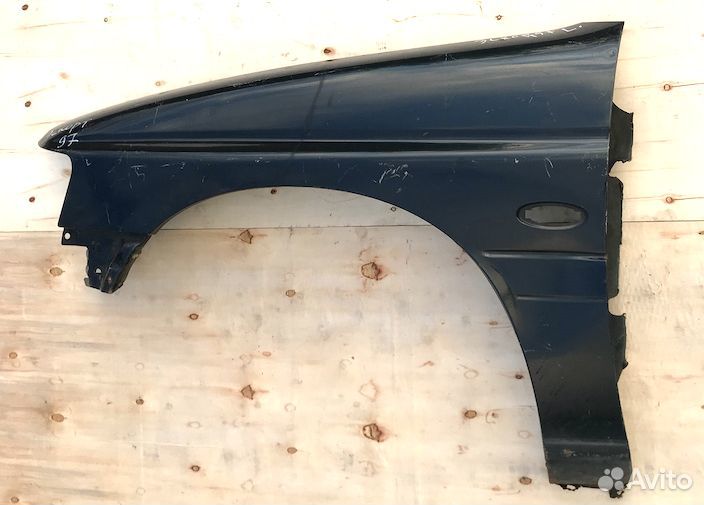 Крыло левое Форд Эскорт Турнир 1997