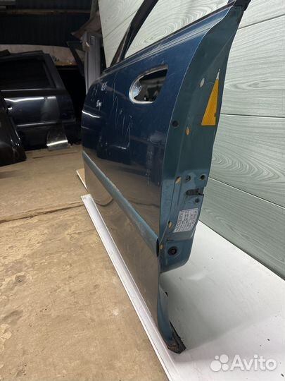 Дверь передняя левая Mazda 626 97-02г