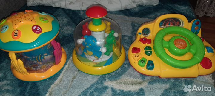 Игрушки: юла, звёздное небо и звук,руль интерактый