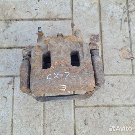 Суппорт тормозной Mazda Cx-7 передний правый