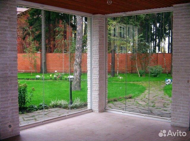 Безрамное остекление домов