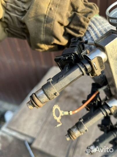 Топливная форсунка Opel Astra 1.4 2012