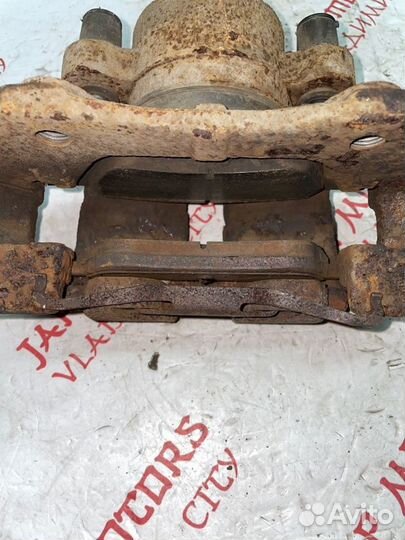 Суппорт тормозной передний левый Ford Escape L3