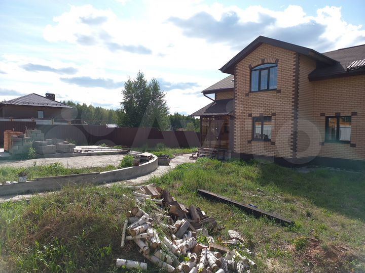 Коттедж 205 м² на участке 9 сот.