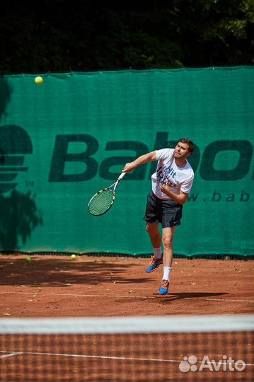 Тренер по большому теннису