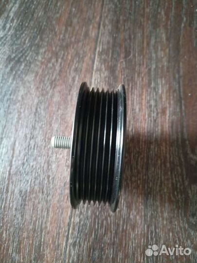 Натяжной ролик