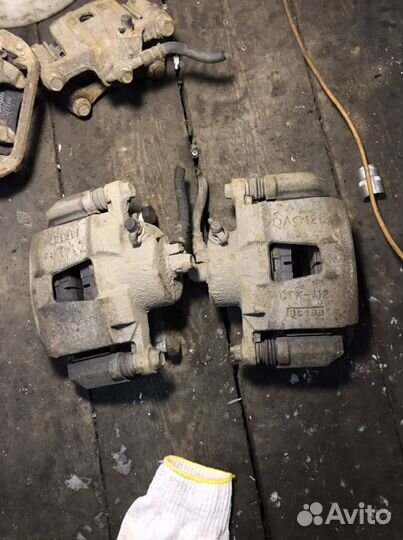 Суппорт передний правый Chevrolet Lacetti