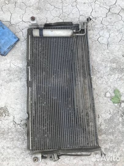 Радиатор кондиционера lancer 9