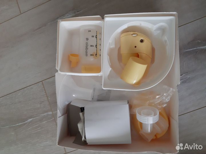 Электрический молокоотсос