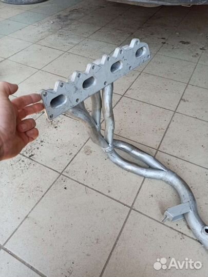 Коллектор выхлопной GM 90411243