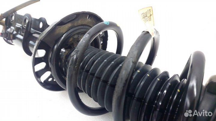 Амортизатор подвески передний левый Kia K5 DL3