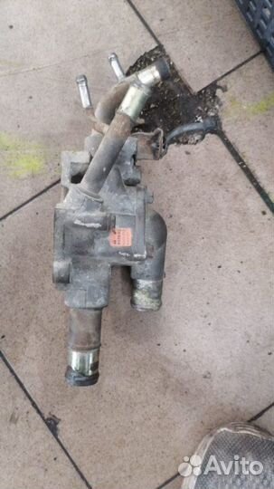 Корпус термостата Nissan Almera Classic B10