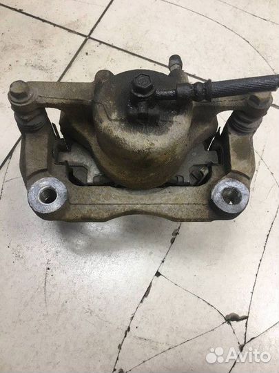 Суппорт тормозной передний правый Nissan Qashqai