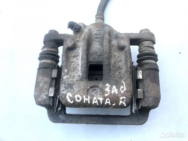 Тормозной суппорт задний правый Hyundai Sonata 5