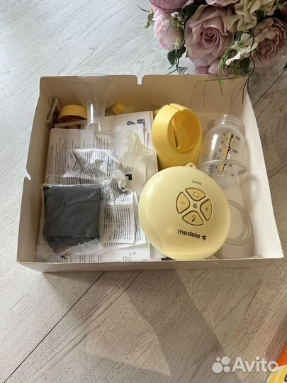 Молокоотсос medela электрический