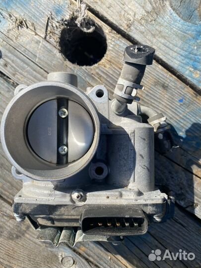 Дроссельная заслонка Мицубиси Лансер 10