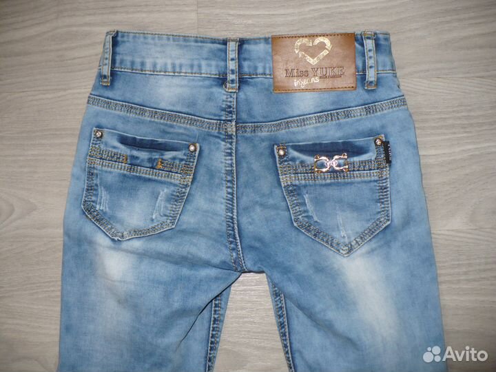 Джинсы голубые