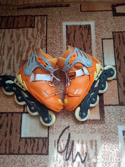 Роликовые коньки