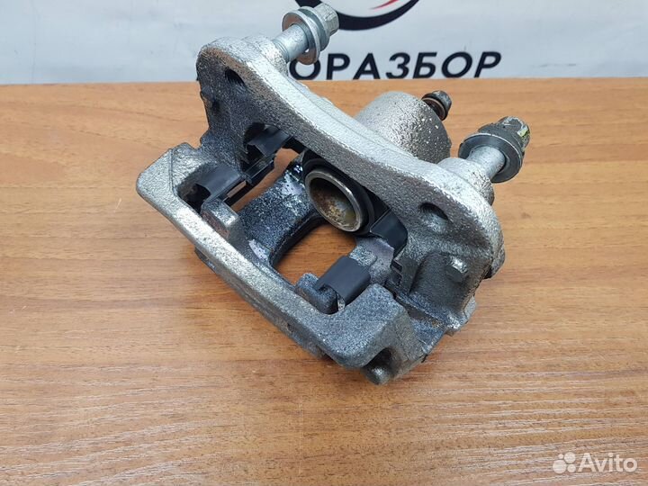 Суппорт задний левый Sportage (QL) 2016-2021