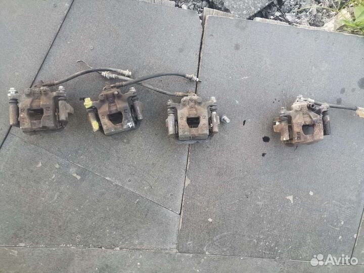 Суппорт задний левый правый Nissan X-Trail T31