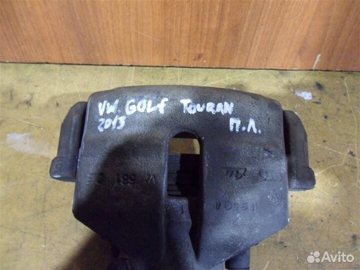 Тормозной суппорт передний левый Volkswagen Golf 6