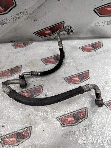 Трубка кондиционера Опель Астра Н Зафира Б