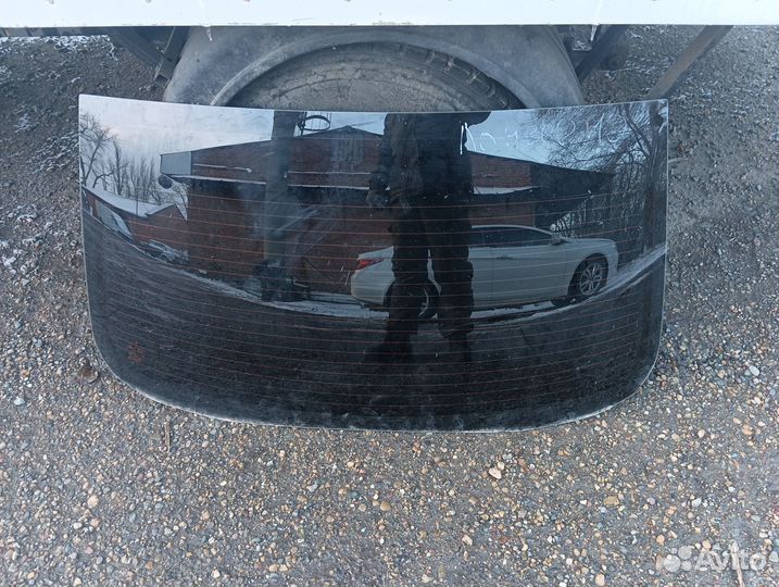 Стекло заднее лансер 10