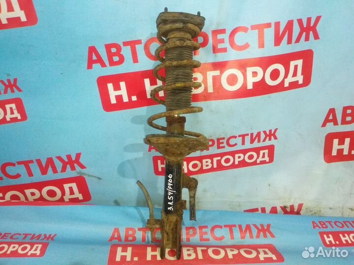 Амортизатор задний левый Тойота Королла 120