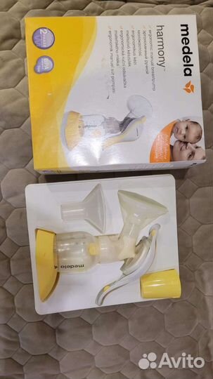 Молокоотсос ручной medela