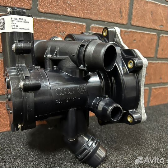 Термостат в сборе с помпой VAG