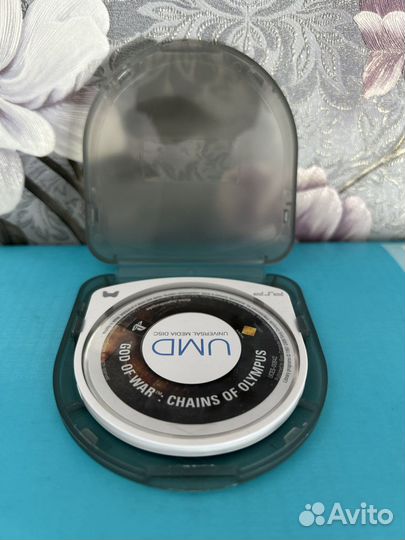 Диск на psp “GOD OF WAR : chains OF olympus”