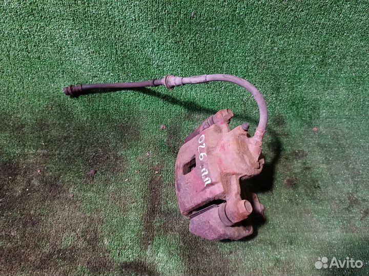 Суппорт тормозной передний Kia Spectra I рестайлин