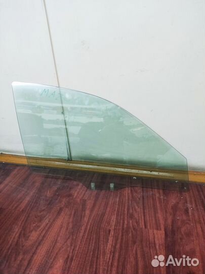 Стекло двери передней правой на mazda capella