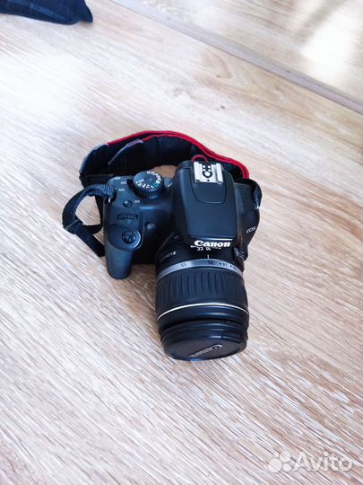 Зеркальный фотоаппарат canon d1000