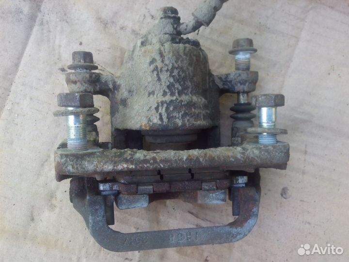 Суппорт тормозной Ниссан Теана 32