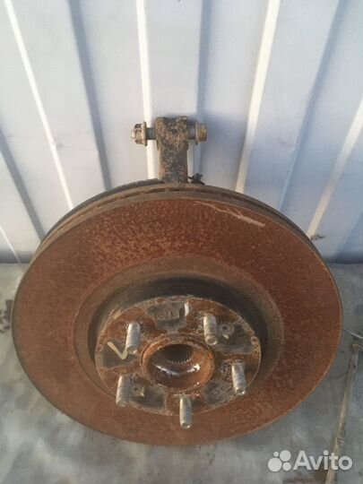 Передний левый поворотный кулак Кия Соренто 2 XM