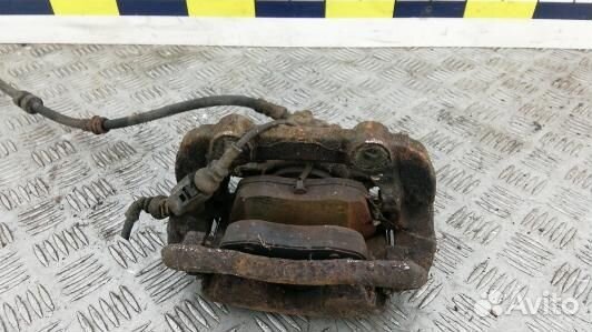 Суппорт тормозной передний левый skoda fabia 2 (93