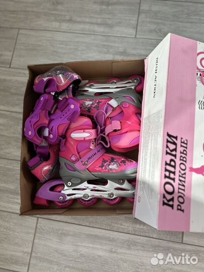 Роликовые коньки и защита