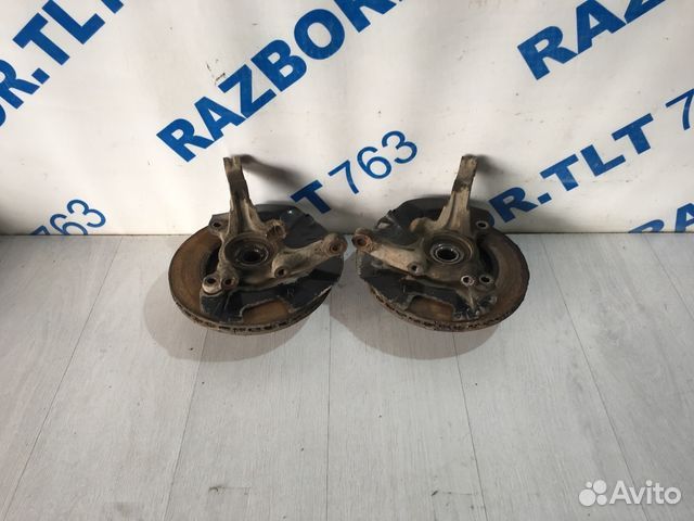 Поворотный кулак передний KIA RIO 2 JB рест 1.6 мт