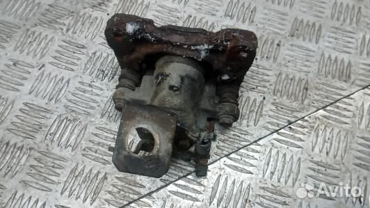 Суппорт тормозной задний левый nissan almera tino